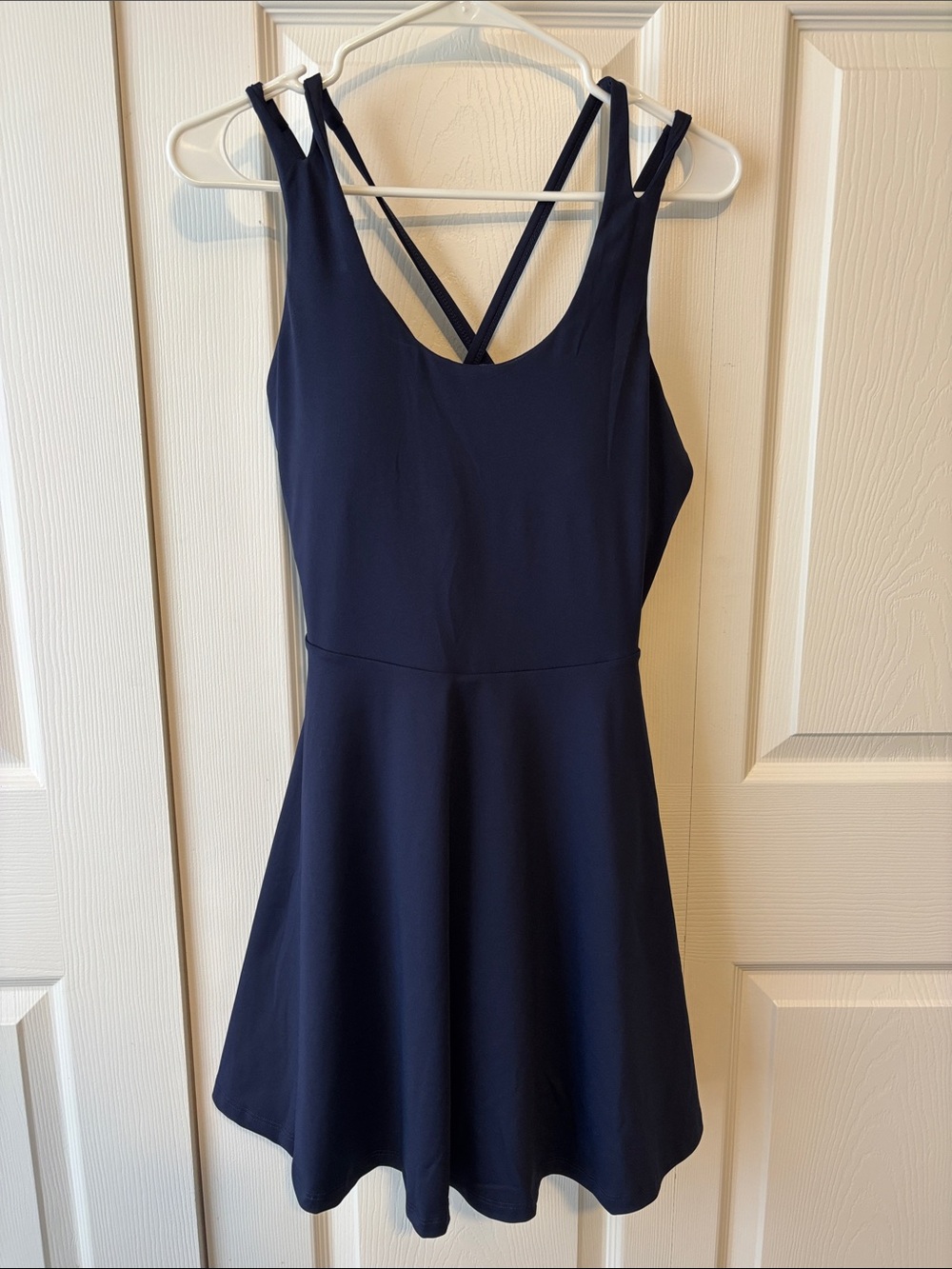 Fabletics women’s Navy Fit-and-Flare Dress with Strappy Back size M.